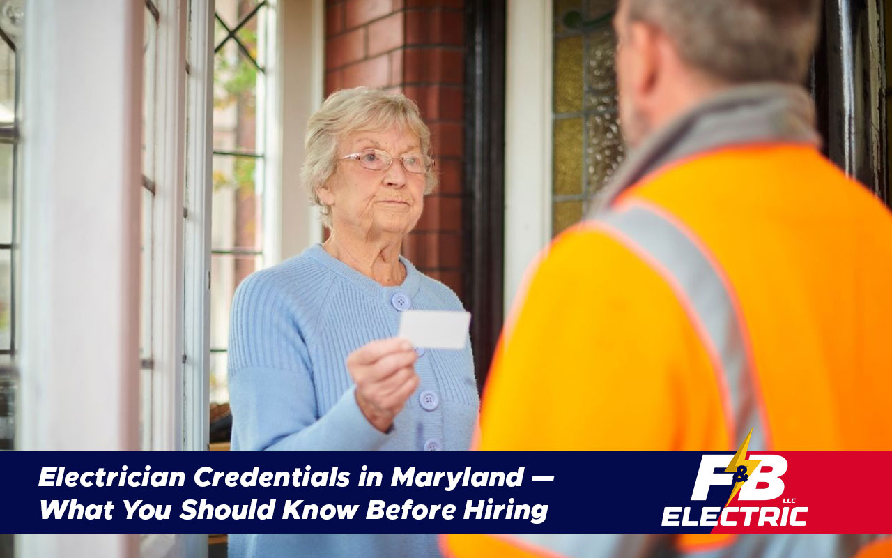 Electrician showing proof of Maryland license to homeowner