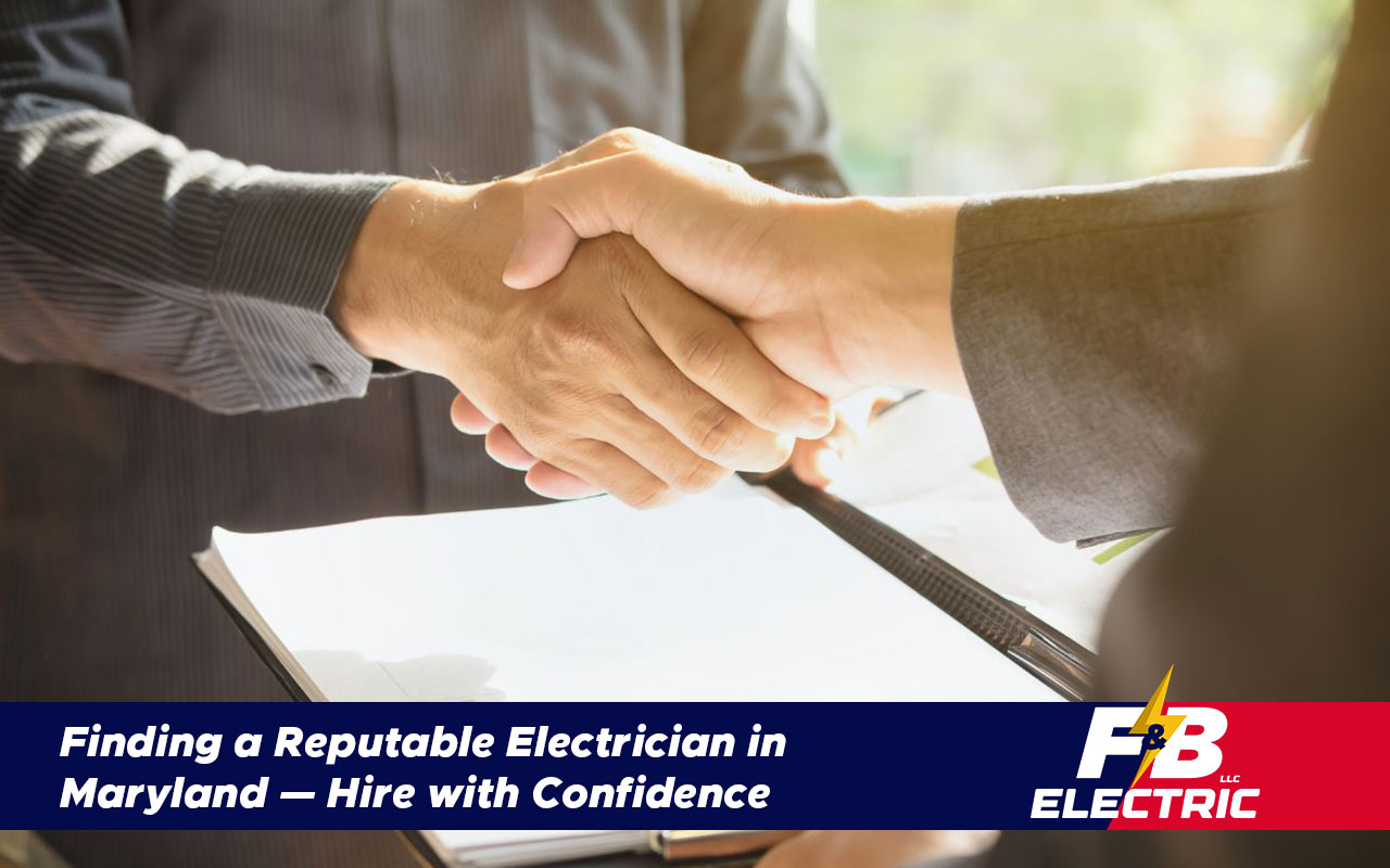 Homeowner shaking hands with a reputable, licensed electrician in Maryland