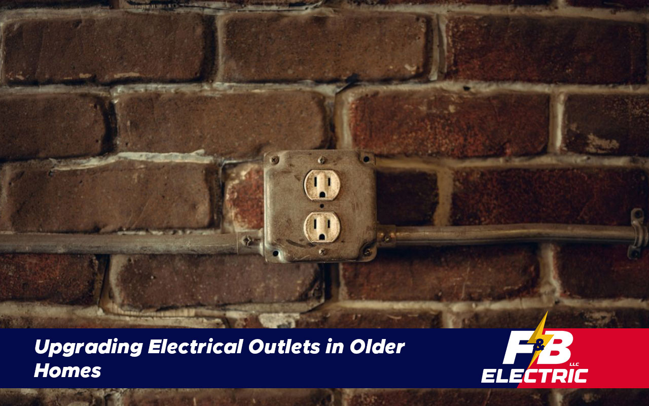 Outdated two-prong electrical outlet on an older wall
