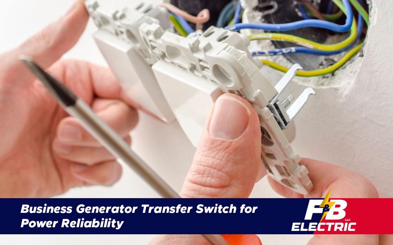 Electrician wiring a commercial generator transfer switch