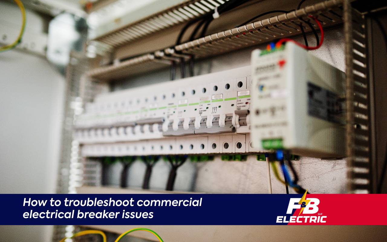 Technician performing Commercial Breaker Troubleshooting in Columbia on a busy commercial electrical panel