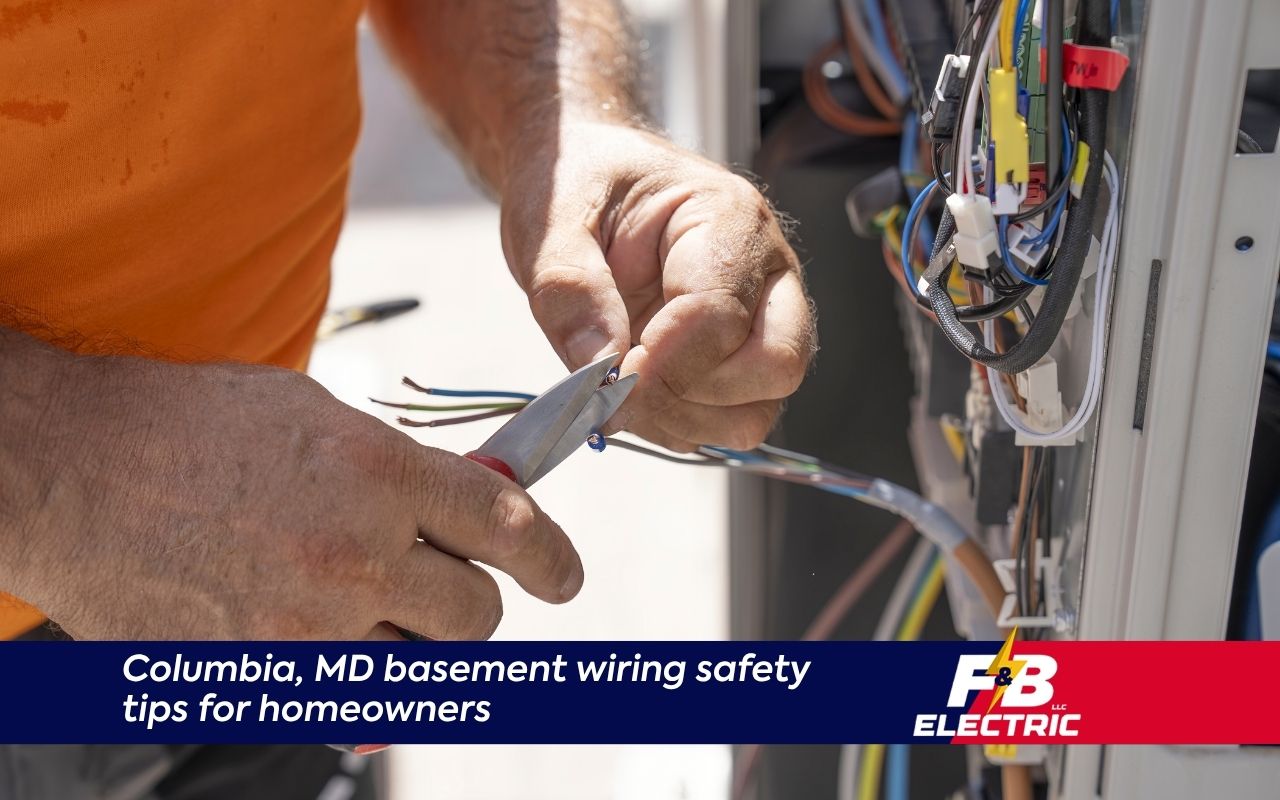 electrician checking basement outlet code in MD for safety